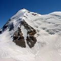 Karl Marks peak — View of the peak of Karl Marks (6700 m) from the Oval top (6000 m)
(6700 ) (6000 ) Karl Marks peak — View of the peak of Karl Marks (6700 m) from the Oval top (6000 m)
(6700 ) (6000 )