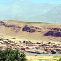 Afghan village over Panj river — Afghan village over Panj river —